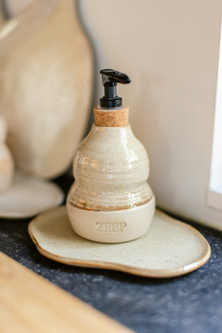 Zeepfles met bordje