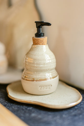 Zeepfles met bordje